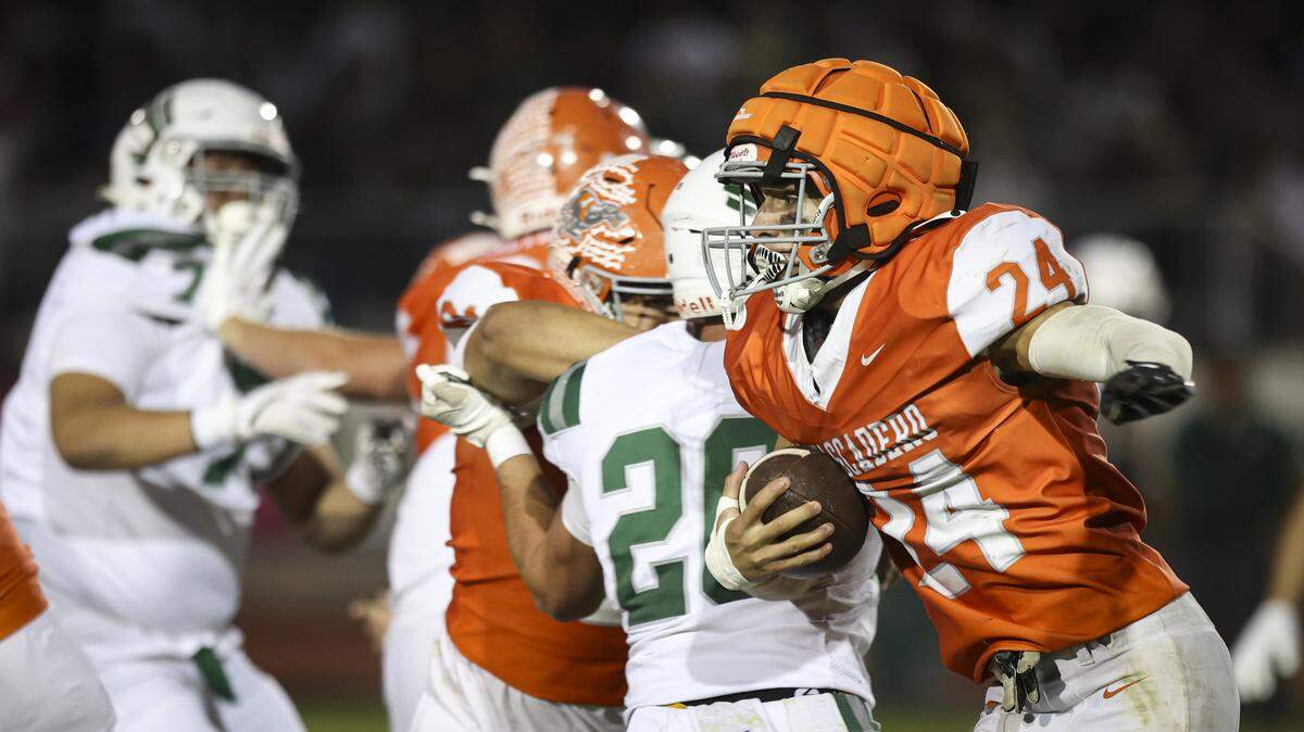 Damon Mitchell carries the ball. The Templeton High School football team beat Atascadero 31-20 on Sept. 26, 2025.