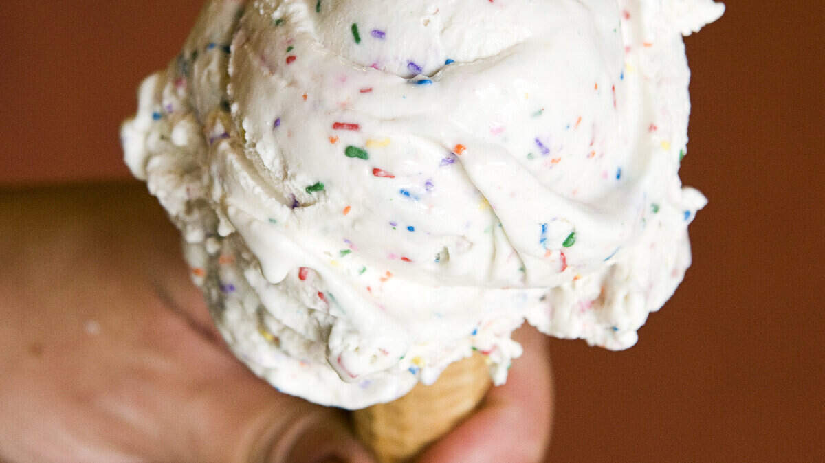 A scoop of Doc Burnstein’s Birthday Cake ice cream on a sugar cone at Village Bean in Cambria in 2014. The ice cream will be availble for a final time at Camp Arroyo Grande Jamboree on June 3, 2023.