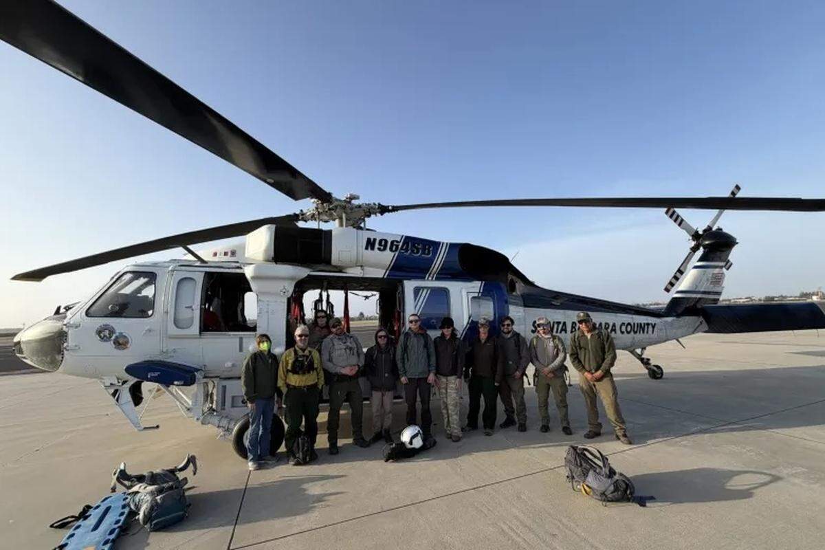 A Santa Barbara County helicopter crew successfully evacuated 11 National Park Service employees from Santa Rosa Island on Sunday, May 17, 2026, amid the ongoing vegetation fire.
