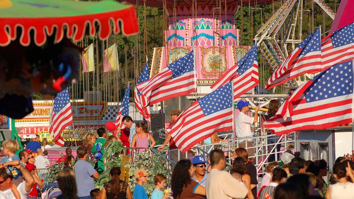 People flocked to the Mid State Fair in Paso Robles as temperatures reached 100 degrees.
