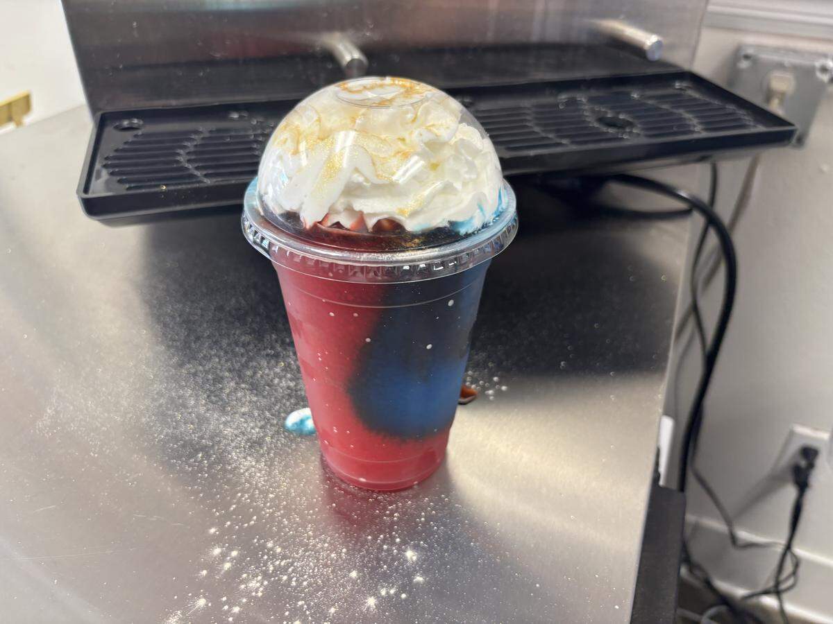 Swell Sandwich Shop in Pismo Beach serves its $5 Beach Freeze, a slushy red and blue drink with whipped cream and edible glitter.