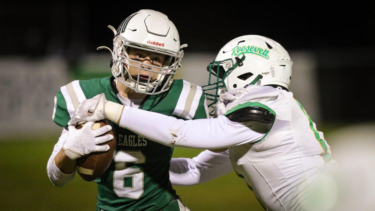 Landen Miller carries the ball for the Eagles. Templeton beat Roosevelt 27-14 on Nov. 4, 2022, in a first-round playoff football game.