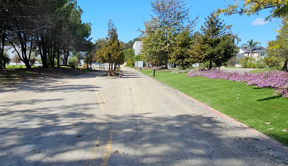The rutted dirt road leading to Bang the Drum Brewery as seen from Laurel Lane. The tenants at 1150 Laurel Lane in San Luis Obispo have been told they have to vacate the property due to unsafe construction conditions. This includes the popular Bang the Drum brewery and SLO City Church, both of which moved into the partially completed building during the COVID pandemic.