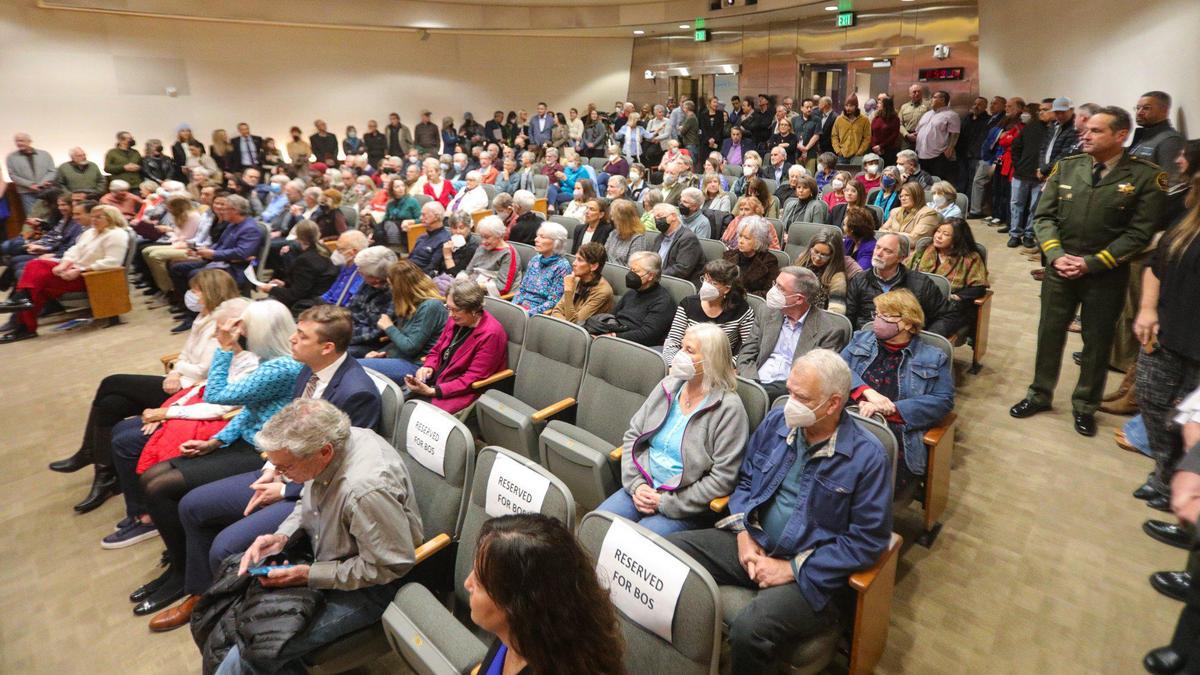 A crowd of family and supporters fill the Board of Supervisors chamber before elected candidates were sworn into office on Tuesday, Jan. 3, 2023.