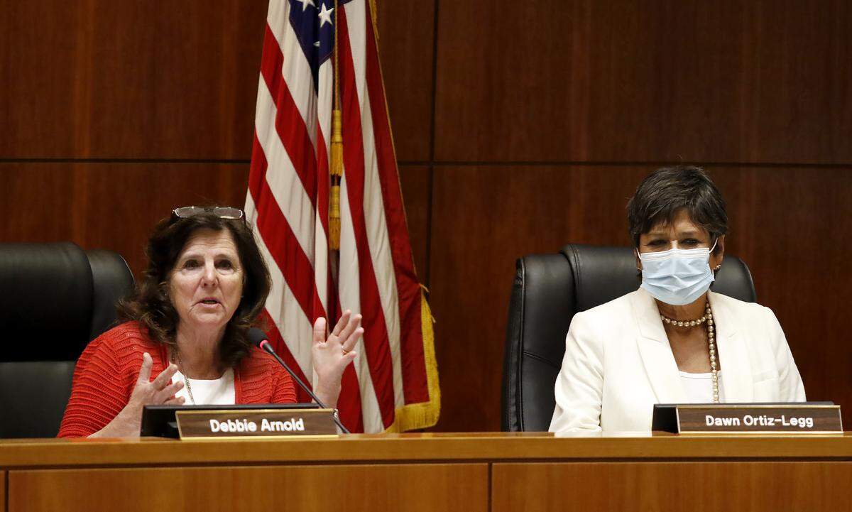 Supervisor Debbie Arnold comments while Dawn Ortiz-Legg listens during the San Luis Obispo County Board of Supervisors redistricting meeting on Nov. 30, 2021. Arnold, like Supervisor John Peschong continues to falsely claim supervisors cannot consider political data when drawing redistricting maps, even to ensure the final product is nonpartisan.