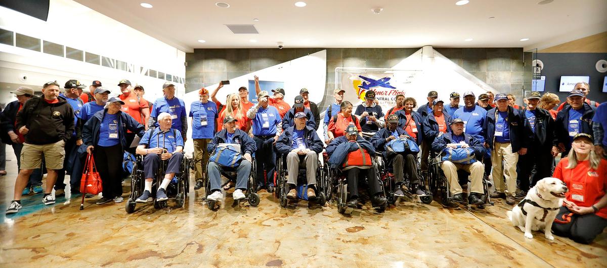 Central Coast Honor Flight veterans arrived at the San Luis Obispo airport on Wednesday night, Oct. 26, 2022, to large, cheering crowd.