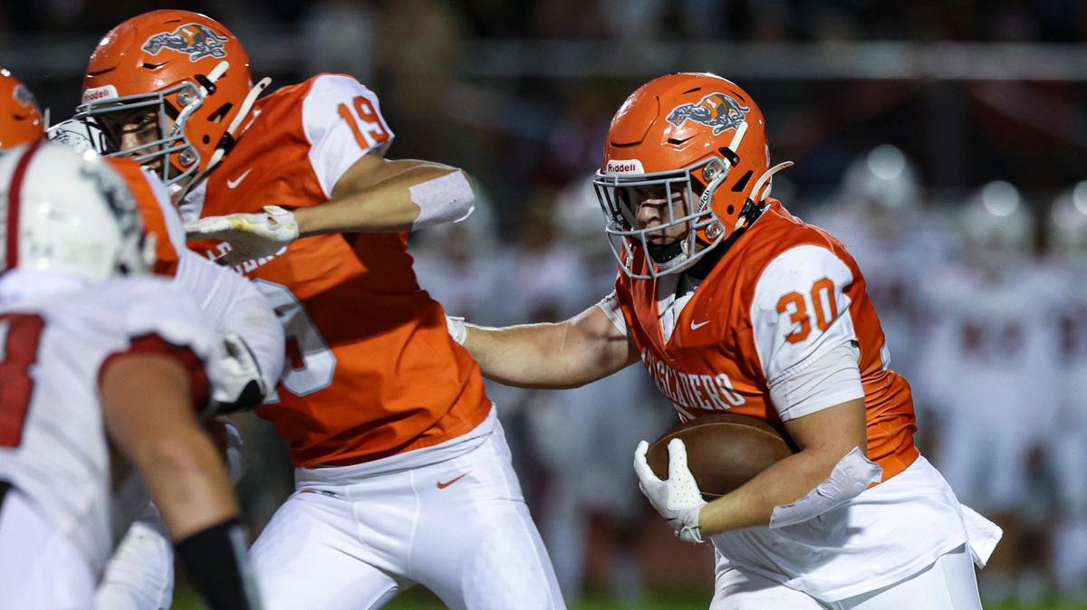 Cole Jeckell blocks for Austin Smith as Atascadero fell to Paso Robles 30-15 win in a high school football game on Sept. 20, 2024.
