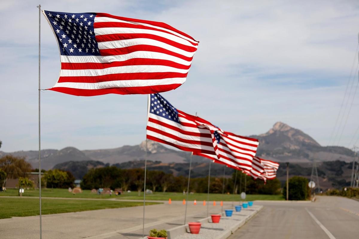 American flags line the road in honor of Veterans Day at the Los Osos Valley Memorial Park, Friday, Nov. 11, 2022.