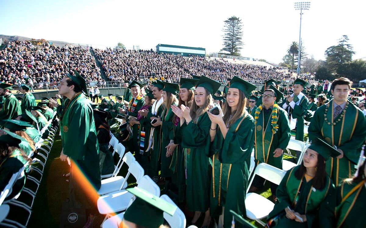 Students stood and cheered when their major was called at Cal Poly’s fall commencement on Dec. 11, 2021.