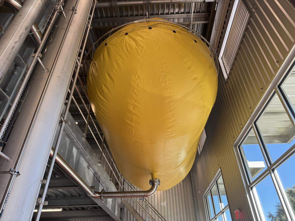 A giant yellow balloon is part of a multi-million dollar state-of-the-art recovery system that captures and redirects carbon dioxide back into beer production at Firestone Walker Brewing Company in Paso Robles.
