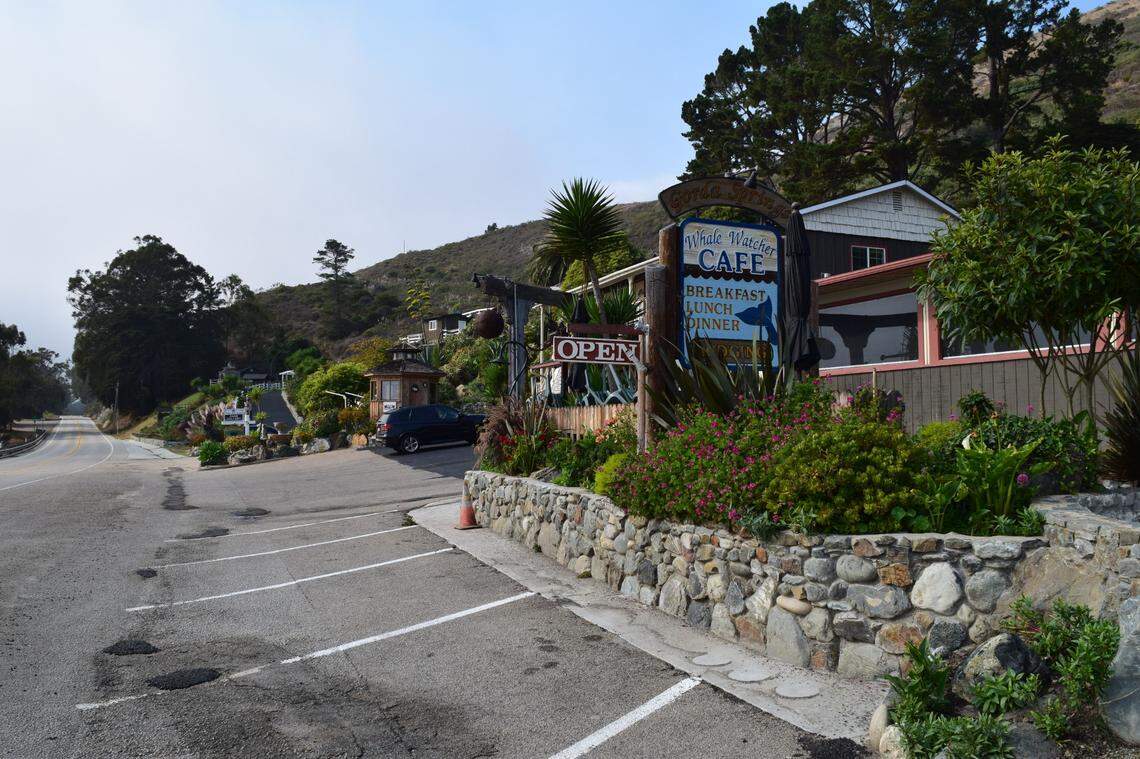 The parking lot at the Whale Watcher Cafe at the Gorda Springs Resort was mostly empty after the Dolan Fire shut down Highway 1 through the area. CHP has since reopened part of the roadway past the resort.