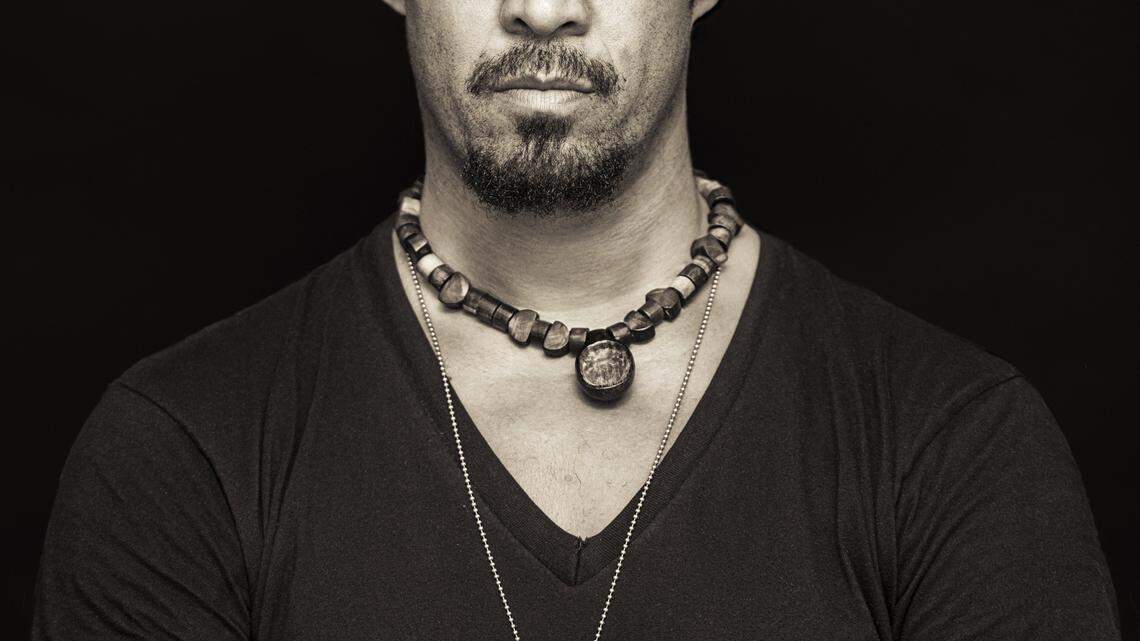 Spearhead frontman Michael Franti performs Saturday at the Fremont Theatre in San Luis Obispo.