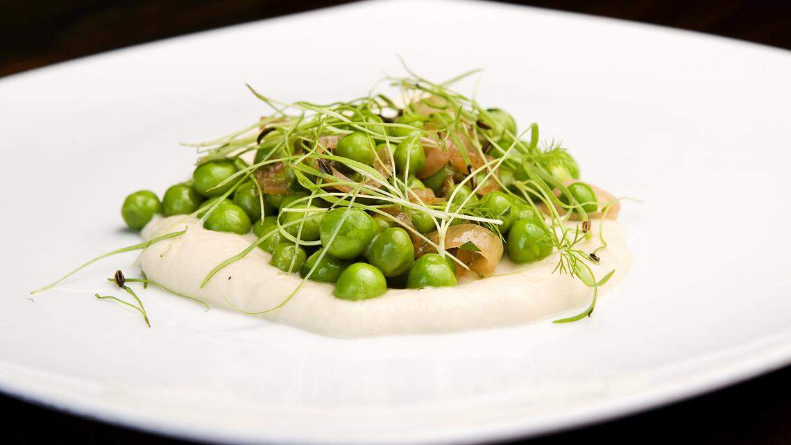 At Lido at the Dolphin Bay Resort & Spa in Pismo Beach, executive chef Jacob Moss offers a warm pea salad as his homage to spring. It includes caramelized shallots and is served with Alaskan halibut.