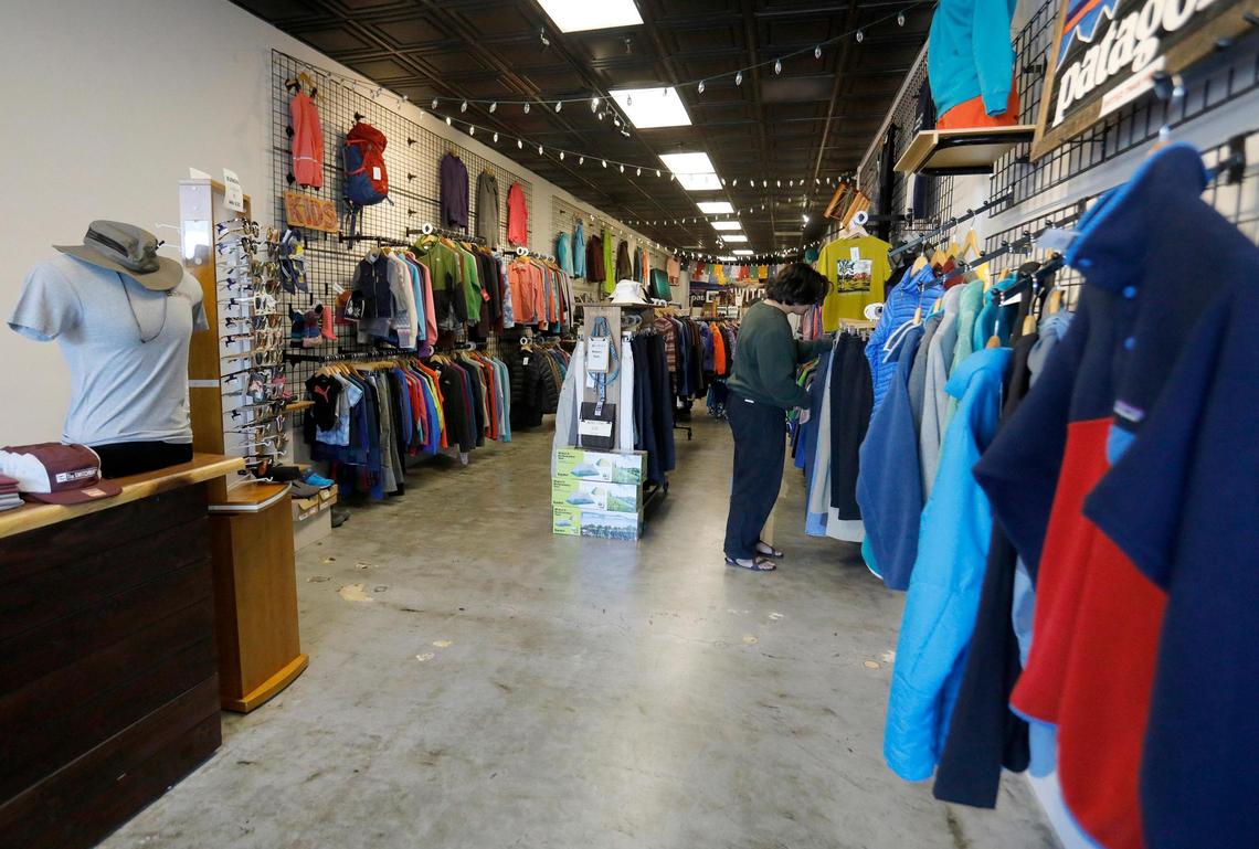 Racks of vintage clothes in hang neatly at The Switchback on Marsh Street in San Luis Obispo. Vintage shops in downtown SLO buy and sell high-quality secondhand