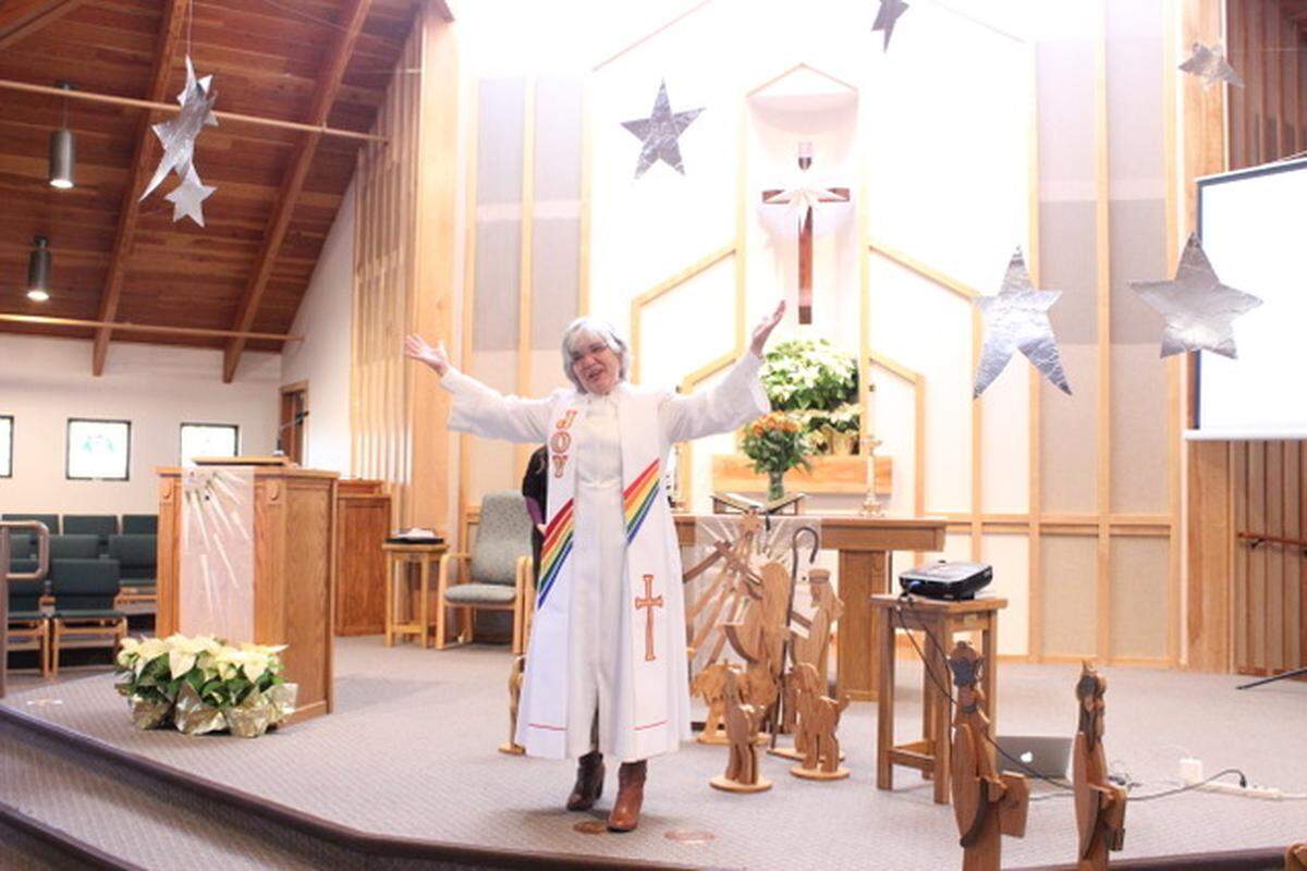 Pastor Diane Rehfield leads a Christmastime service at Atascadero United Methodist Church. “I firmly believe and can back it up biblically that God loves everybody,” she told The Tribune. “There are no second-class citizens in my church.”
