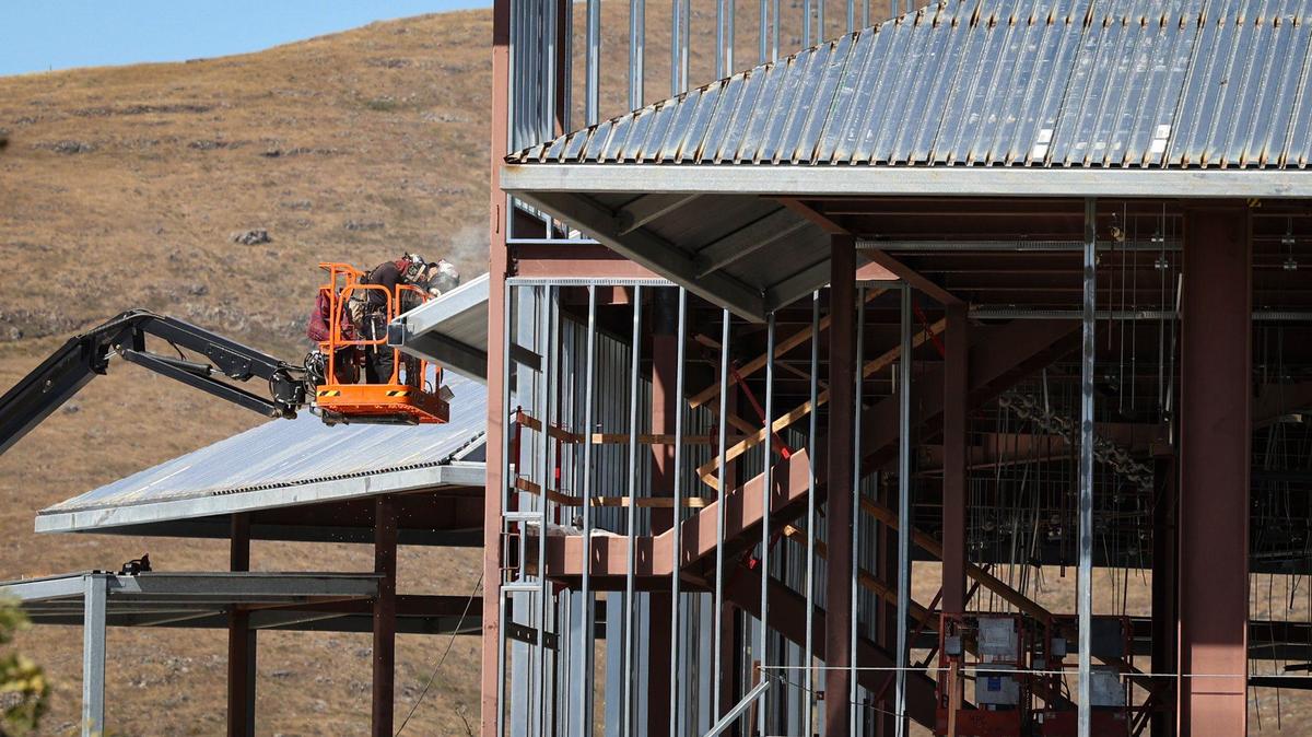 Welders work on the roof of the new Campus Center Building on the main campus of Cuesta College, as seen on June 4, 2024.