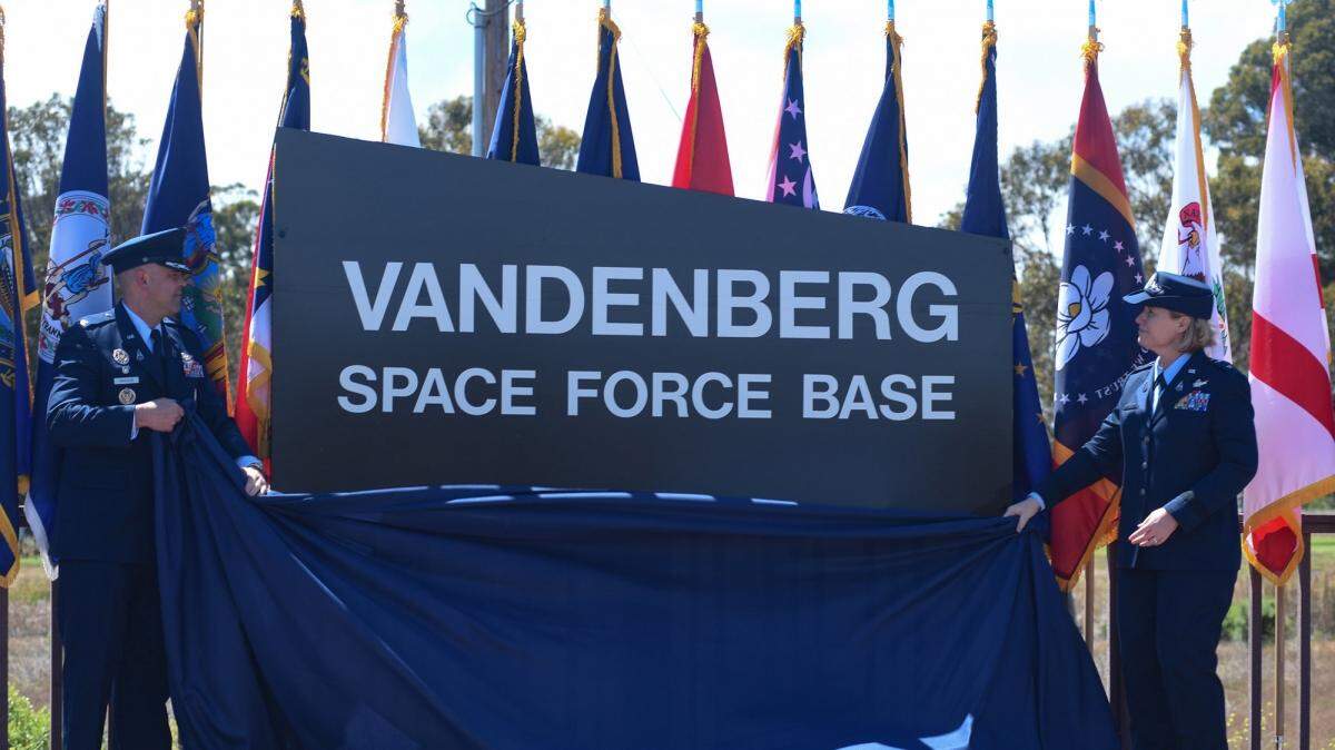 Col. Anthony Mastalir, Space Launch Delta 30 commander, and Maj. Gen. Deanna Burt, Combined Force Space Component Command commander, unveil Vandenberg’s new U.S. Space Force name during a renaming ceremony in May 2021.