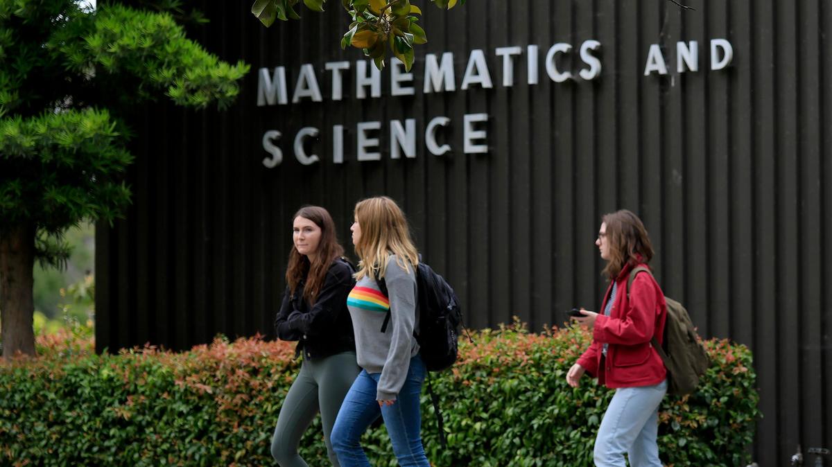 Cal Poly students walk past the mathematics building on campus. The university accepted only 28% of freshman applicants for fall 2019.
