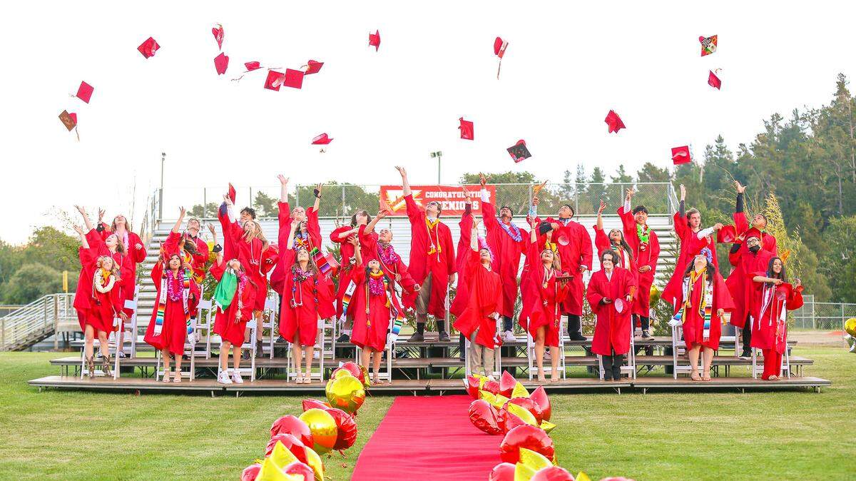 Live events, including graduations, were back in 2021. Here, Coast Union High grads toss their caps in the air.
