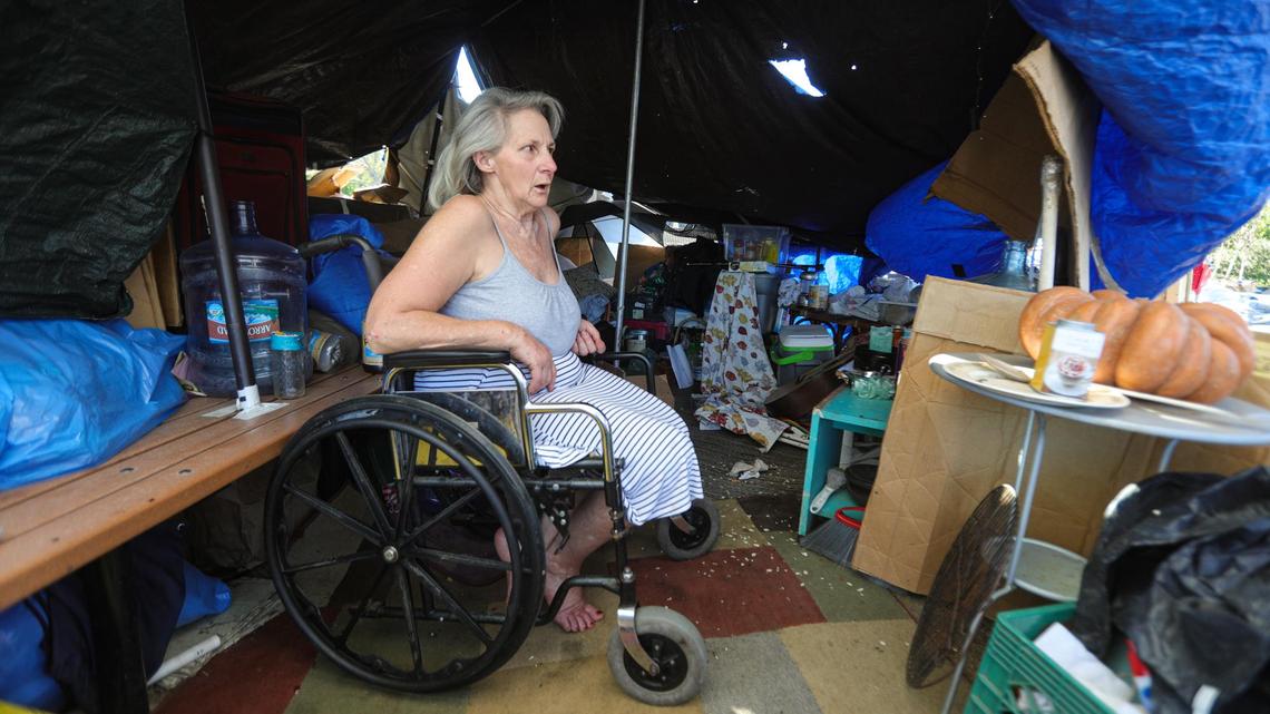 Darcene Clayton has a broken hip and hopes to get settled in an apartment but finds coordinating services is difficult. She lives along the Bob Jones Trail. Homeless camp cleanup prep Bob Jones Trail.