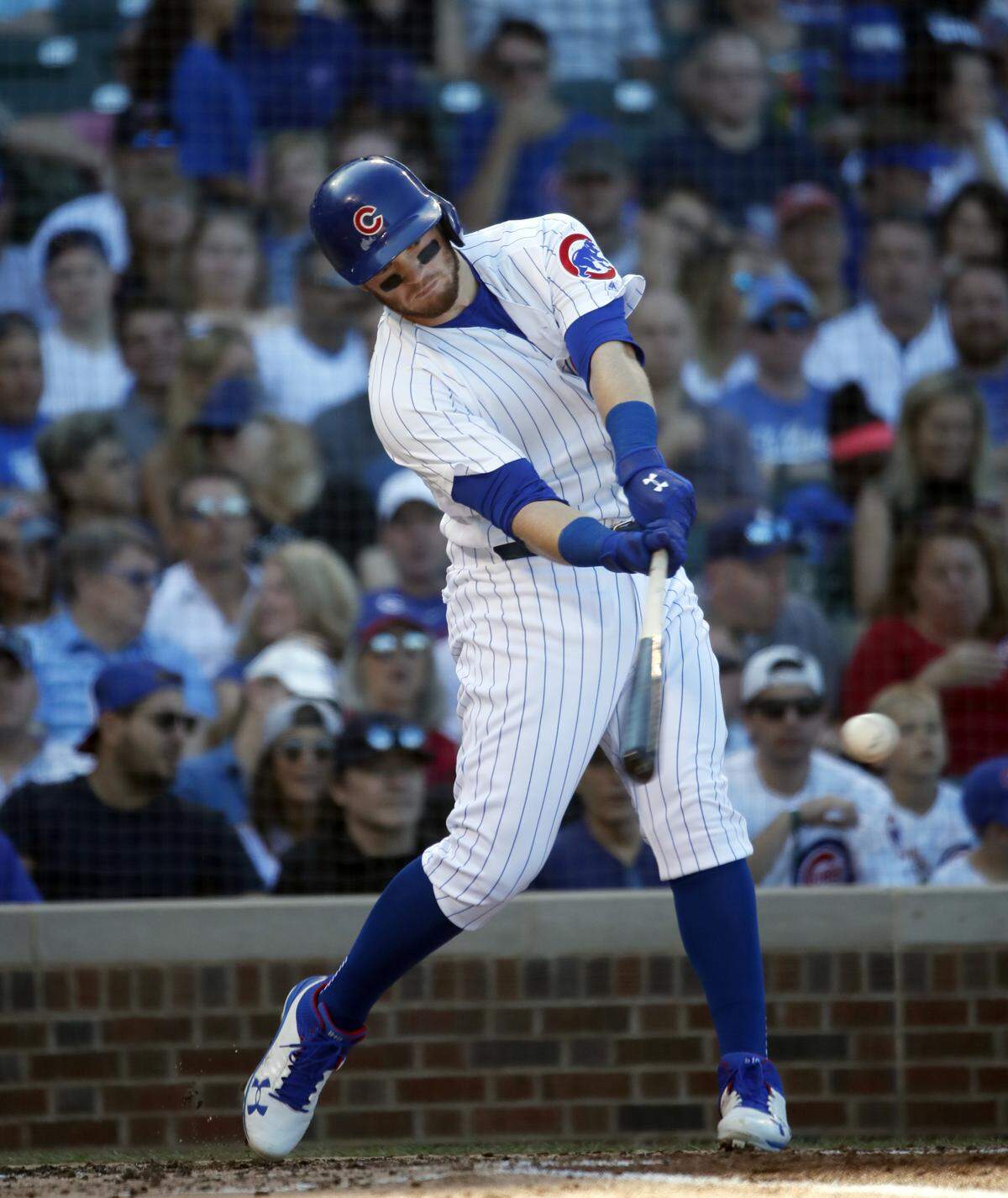 Chicago Cubs’ Ian Happ swings at a pitch during the third inning of a baseball game against the Cincinnati Reds in Chicago, on Saturday, Sept. 15. Happ will play in the Straight Down Fall Classic golf tournament Saturday and Sunday in San Luis Obispo, California.