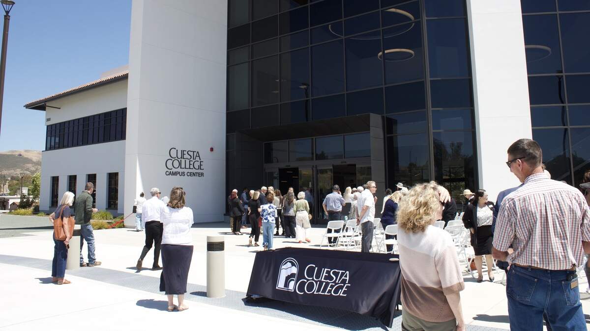People gather for a ceremony celebrating the opening of Cuesta College’s San Luis Obispo Campus Center on Wednesday, June 3, 2026. The building combines student services with administrative offices, in hopes of being a one stop shop for students to receive assistance and socialize at. “My goal with each new building, is to make this a place that students want to spend time at,” said Cuesta College President Jill Stearns.