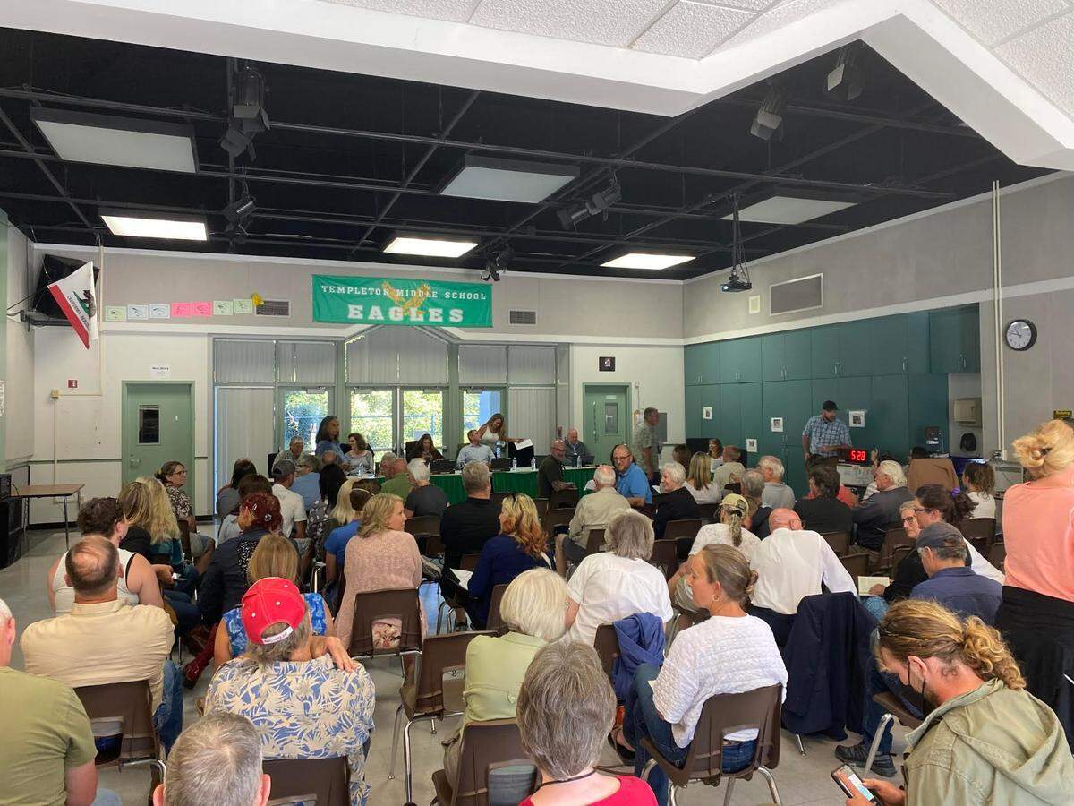 Community members, parents and students gather in the band room at Templeton Middle School for the meeting about transgender students’ use of restrooms and locker rooms.