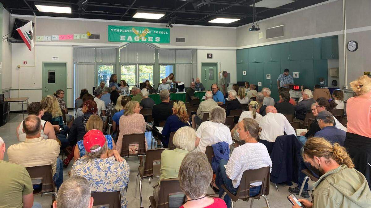 Community members, parents and students gather in the band room at Templeton Middle School for the district board meeting on June 20, 2023, about transgender students’ use of restrooms and locker rooms.