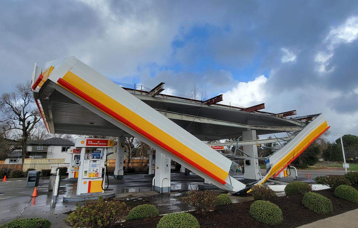 High winds ripped off the awning over the gas pumps at the Shell station at the corner of Highway 41 and Cubaril Avenue in Atascadero on Thursday, Jan. 5, 2023.