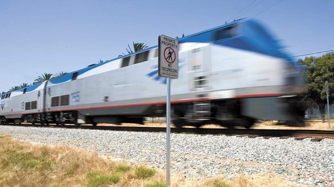 A southbound Amtrak train passes through San Luis Obispo in 2010. The the Los Angeles – San Diego – San Luis Obispo (LOSSAN) Rail Corridor Agency is proposing a major expansion in the railroad area in San Luis Obispo.