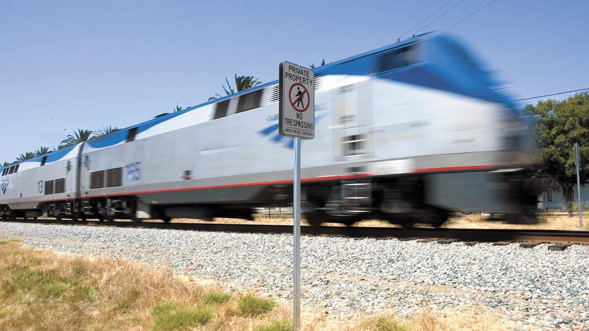 A southbound Amtrak trains passes through San Luis Obispo in 2010. The Santa Barbara County Sheriff’s Office has identified the woman hit and killed by an Amtrak train in Montecito on Friday as Casilina Gallagher, 33.