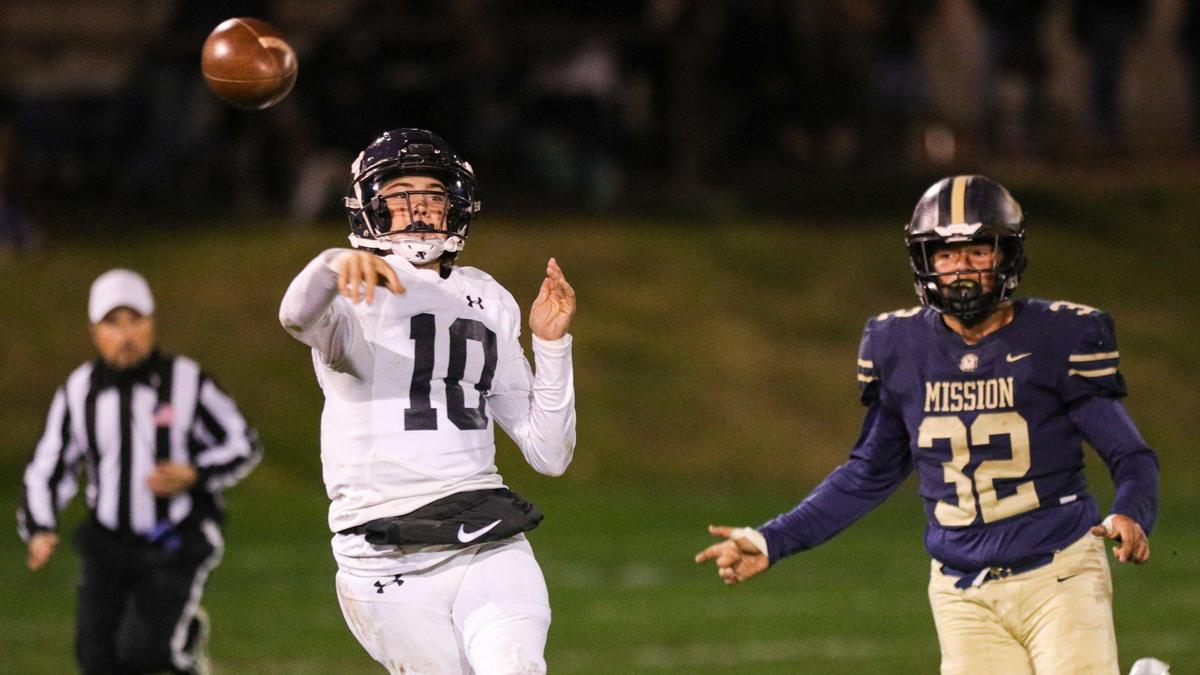 Drake Missamore is pursued by Isaac Townsend. Mission Prep beat Arroyo Grande 35-14 in second-round CIF Central Section football playoff game on Nov. 10, 2022.