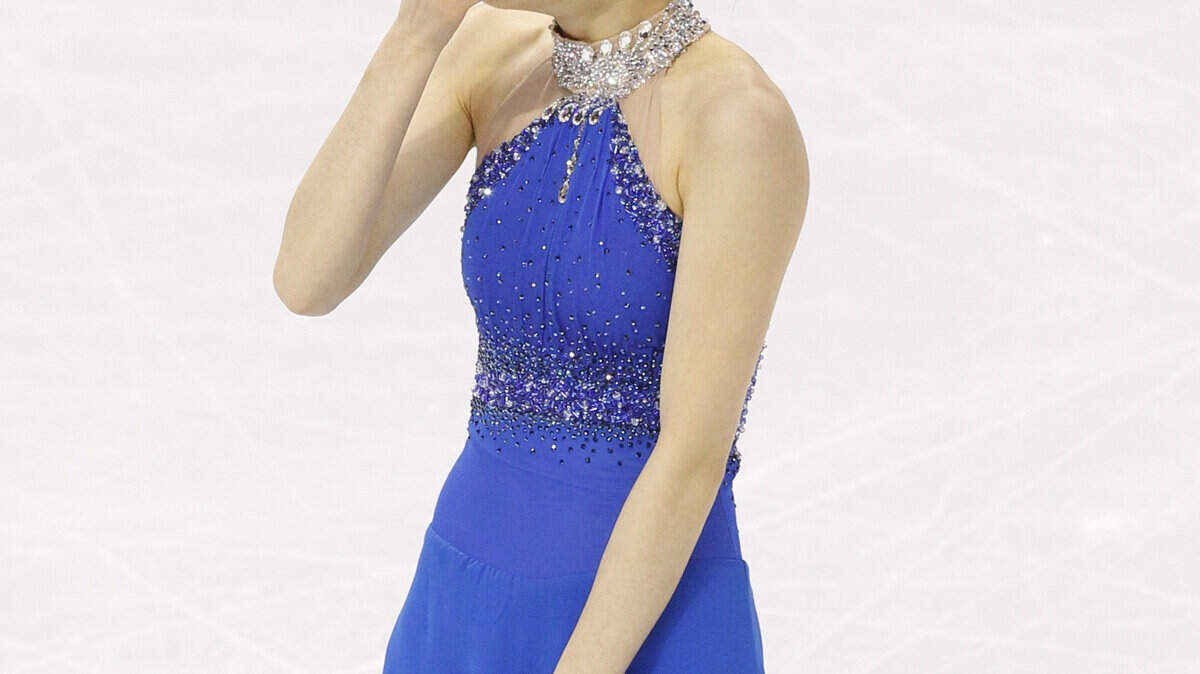 Kim Yu-Na of Korea reacts with joy after her routine. (George Bridges/MCT)