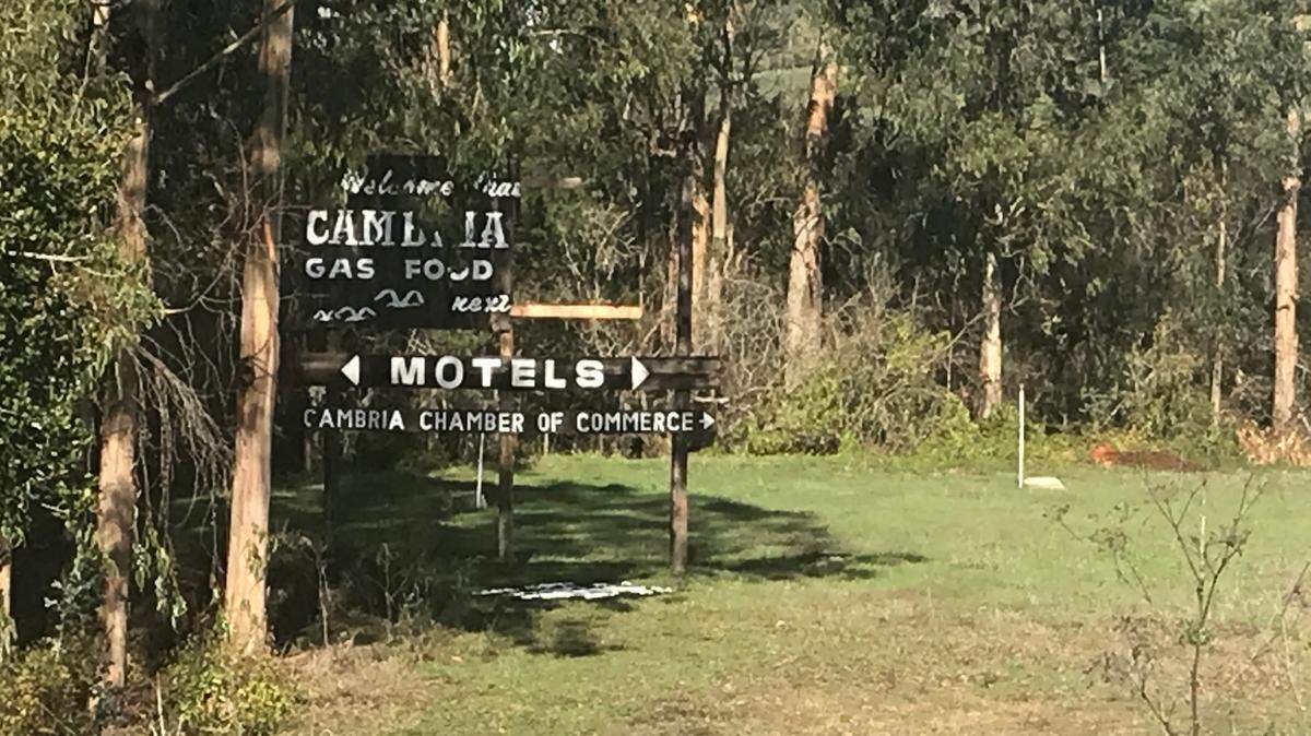 A vintage wooden sign that welcomes visitors to Cambria has been damaged by recent storm winds. The Cambria Chamber of Commerce has launched efforts to have repairs made to the billboard that nestles up to (and is partially obscured by) trees on the East Ranch portion of Fiscalini Ranch Preserve.