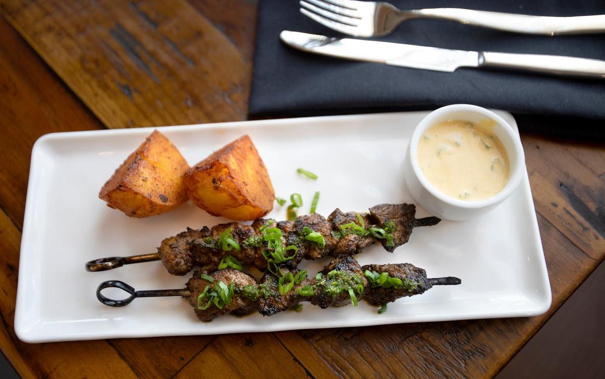 Anticuchos, Peruvian skewer with panka marinated pork, is one of the menu items at Kiko, a new restaurant at San Luis Obispo’s Mission Mall.