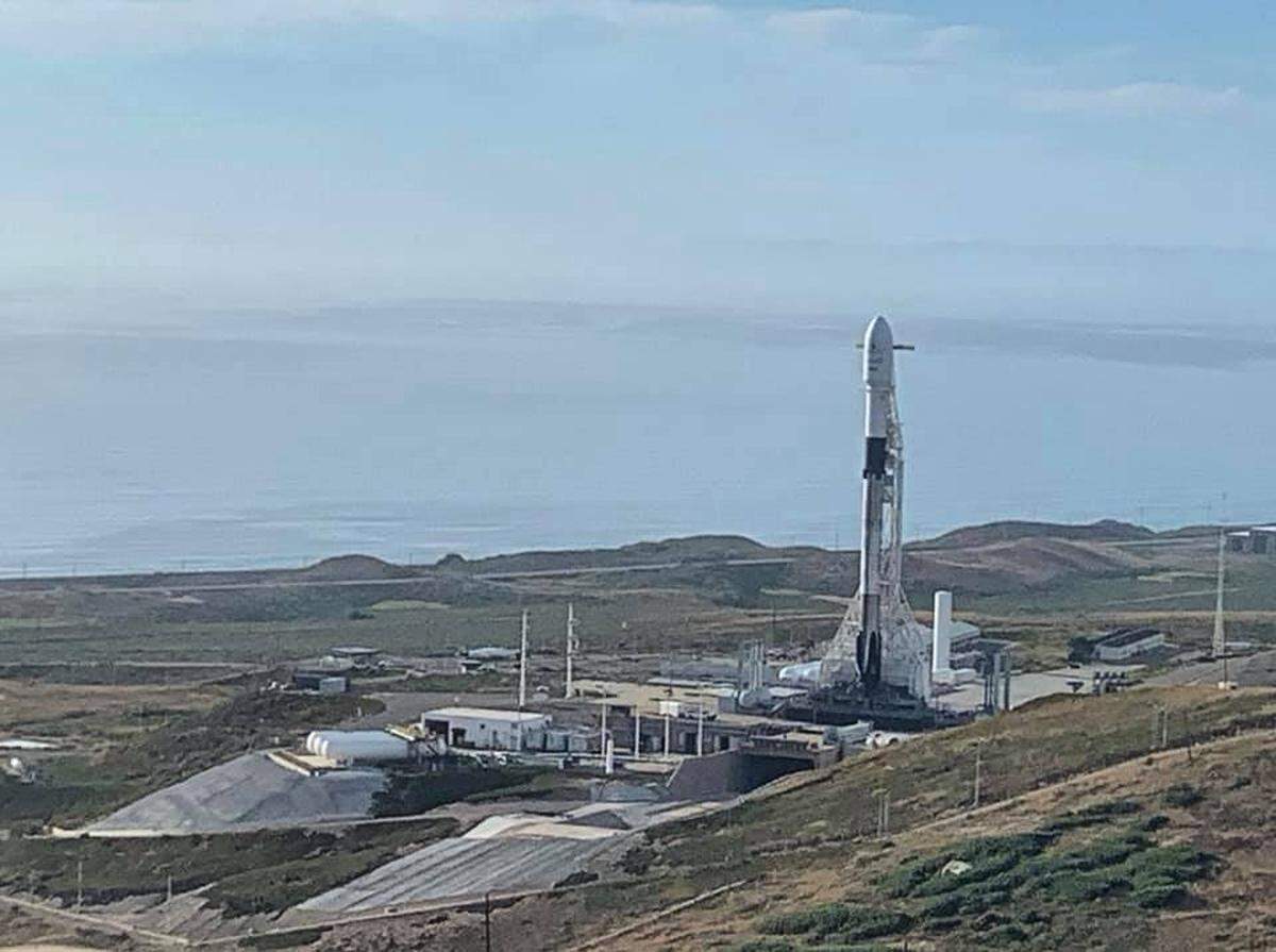 SpaceX’s Falcon 9 rocket was upright and ready for liftoff in June 2019 before its anticipated morning launch.