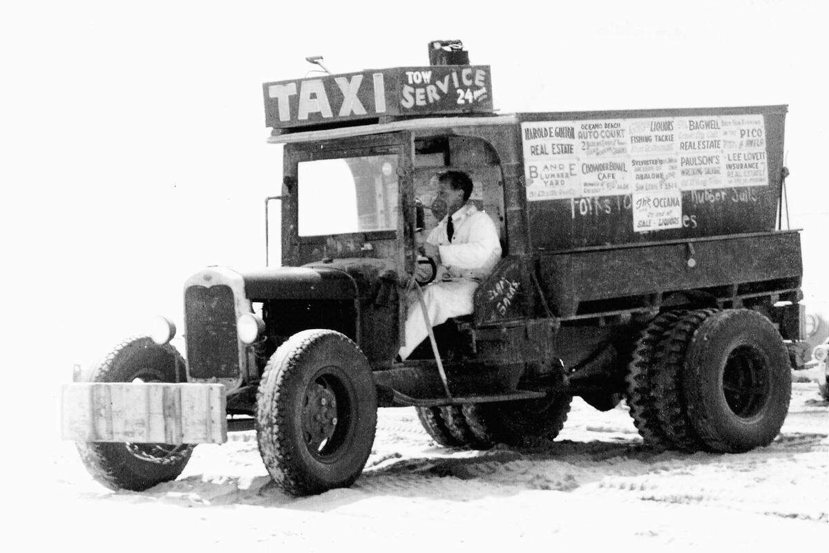 Bill Lovern ran a clam and tackle shop in Pismo Beach in the 1940s. He outfitted this 1929 Ford as a Clam Taxi and would drive clammers to their favorite spots on the beach. He also offered 24-hour towing service.