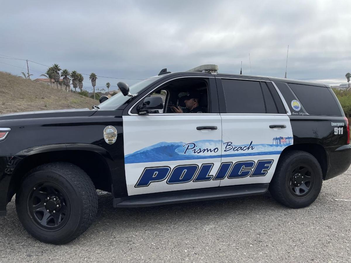 Former Pismo Beach Police Department Sergeant Adrian Souza sits in his marked police vehicle in the Judkins Middle School parking lot in Pismo Beach some time in 2020. A woman he would meet and sext on-duty sent this photo to the Pismo Beach Police Department as part of an internal affairs investigation.
