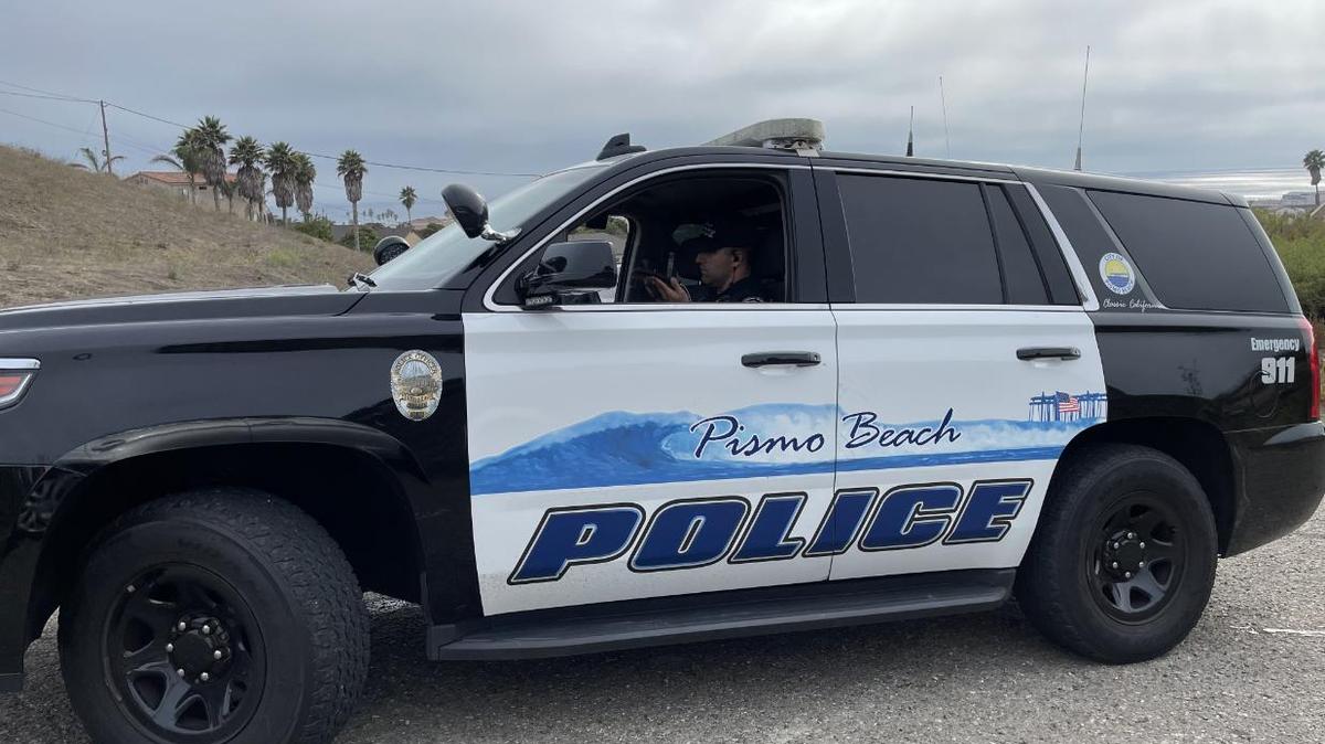 Former Pismo Beach Police Department Sergeant Adrian Souza sits in his marked police vehicle in the Judkins Middle School parking lot in Pismo Beach some time in 2020. A woman he would meet and sext on-duty sent this photo to the Pismo Beach Police Department as part of an internal affairs investigation.