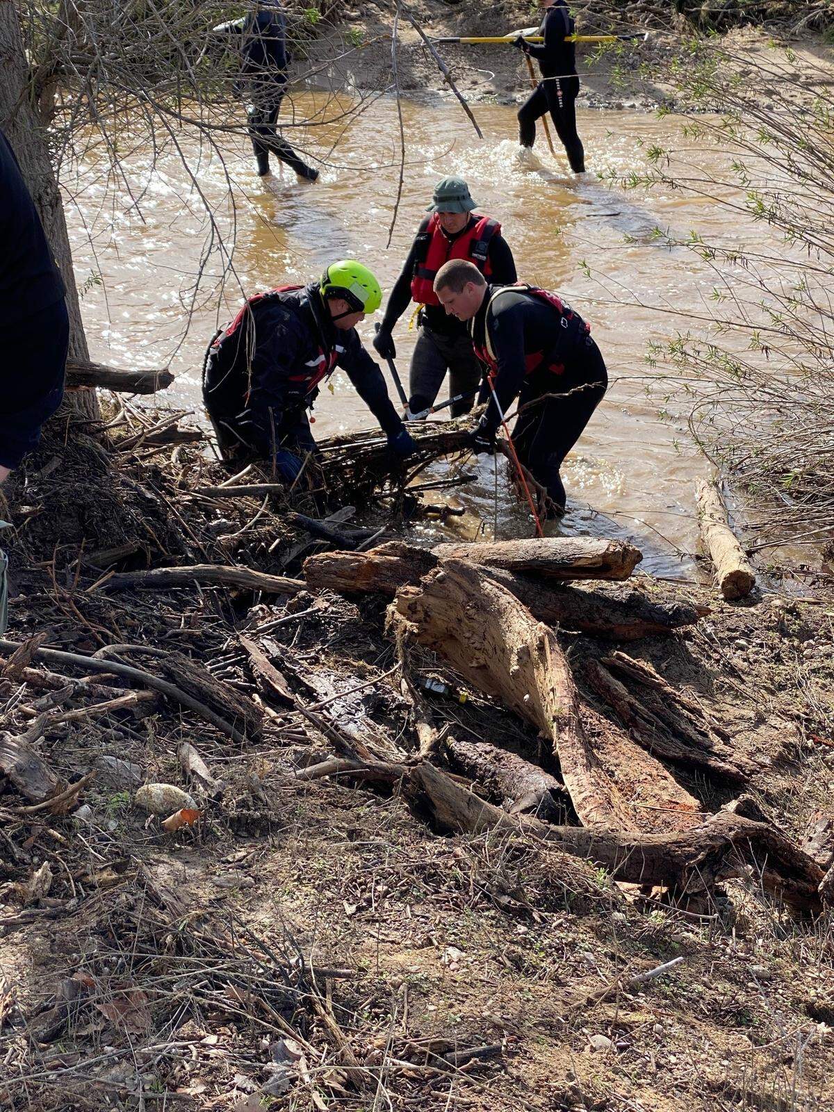 Search teams look for 5-year-old Kyle Doan, who went missing Jan. 9, 2023, near San Miguel when he was carried away by floodwaters. Doan has not been found after three days of searching.