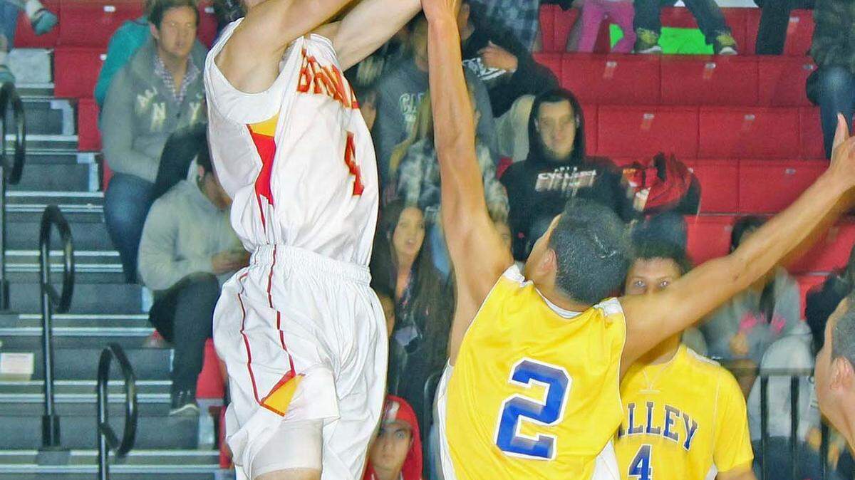 Bronco Quinten Raethke goes up to take a shot in action on Dec. 19.