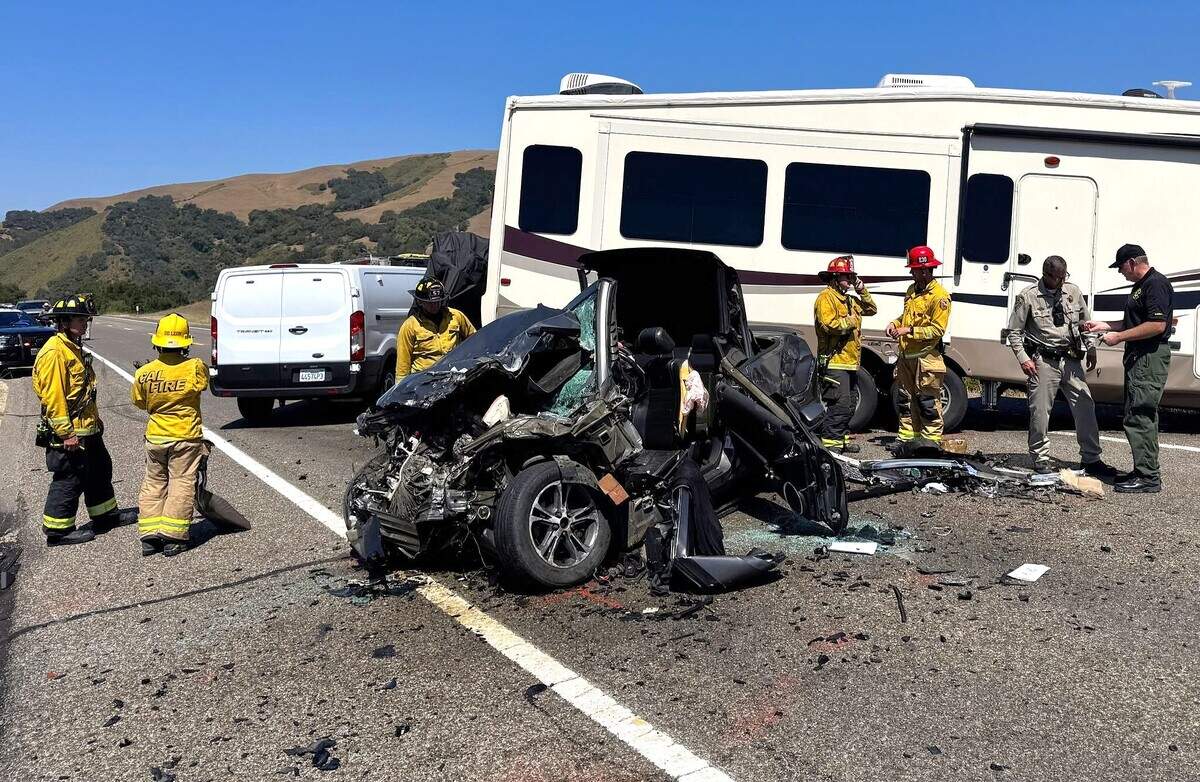 Emergency crews work at the scene of a fatal head-on crash involving a Ford Mustang and a pickup truck towing a fifth-wheel trailer on Highway 46 west of Paso Robles on Sunday, June 7, 2026.