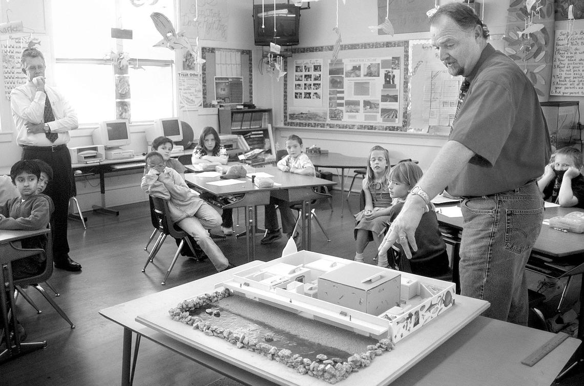 Morro Elementary School teacher Guy Crabb’s third grade class, which built a model of an aquarium project for Morro Bay, presents it to Mayor Roger Anderson in 2002.