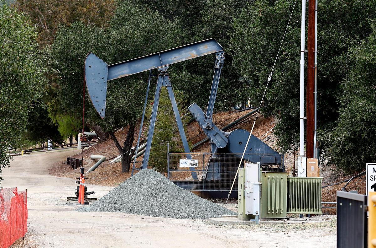 The actively-pumping oil well, “17-6SPL R,” is a “replacement well” to replace well “17-6SPL,” which was supposedly plugged and abandoned, according to data from CalGEM. The county approved this well in January 2018. Directly adjacent to it, in the foreground, a new well, “17-5SPM R” was approved by the county for construction in March 2021.