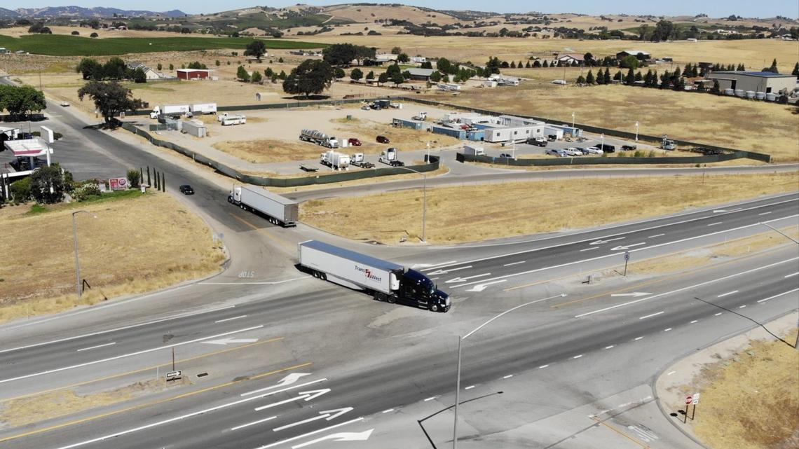 A view of the intersection of Wellsona Road and Highway 101 shows a truck turning left onto Highway 101. The crossing has been the location of multiple deadly crashes and is slated for improvements with construction beginning in 2025.