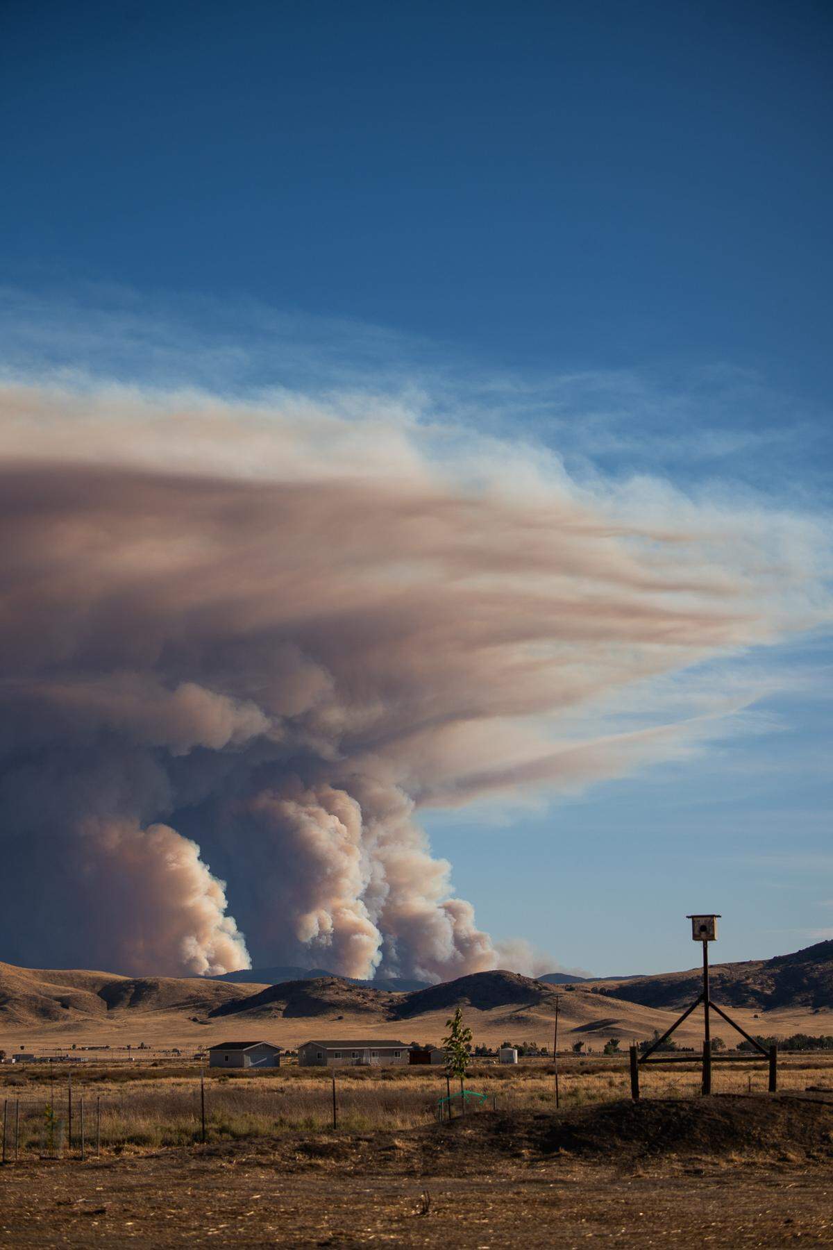 The Gifford Fire sends up a column of smoke as seen from California Valley in San Luis Obispo County on Aug. 3, 2025.