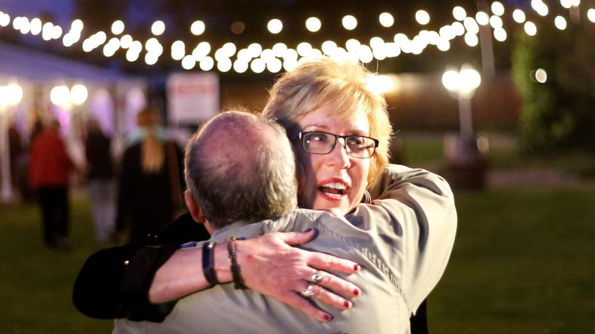 District 3 supervisor candidate Stacy Korsgaden hugs Steve Krivit at her election night party in Grover Beach.