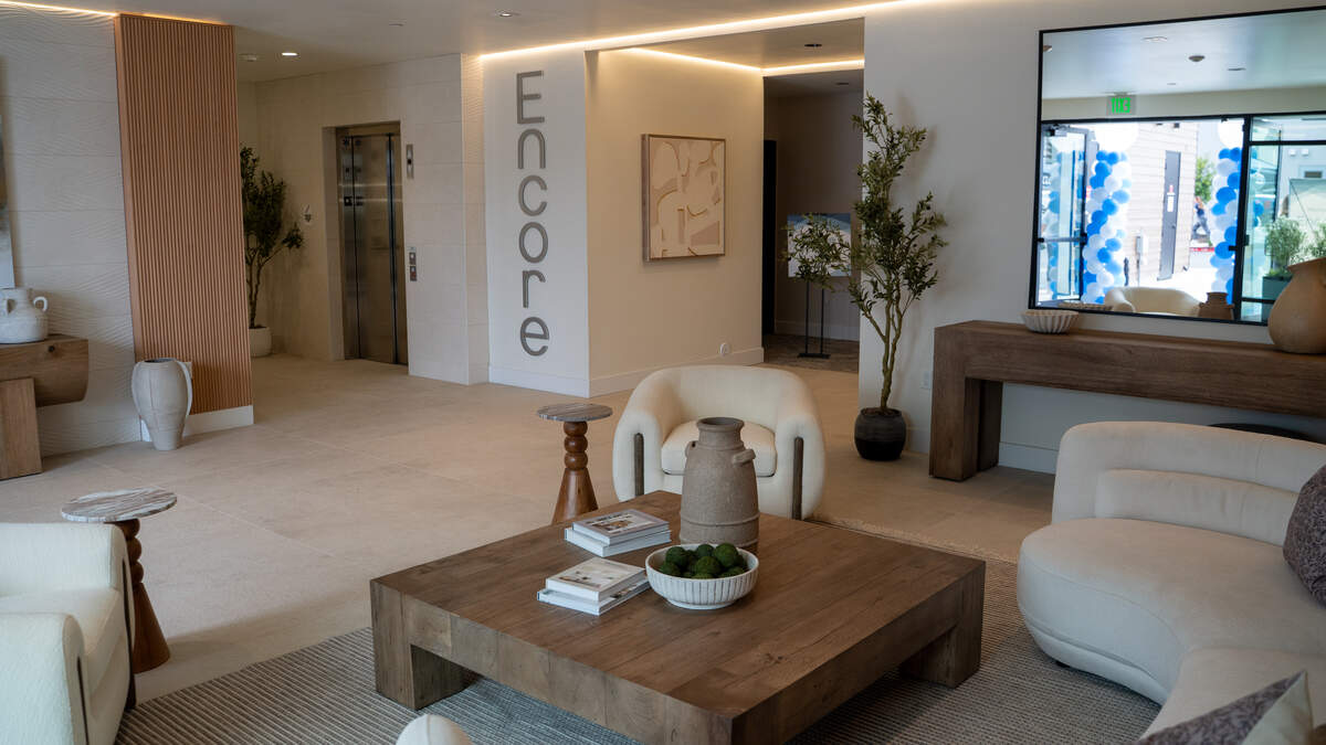Developer Coastal Community Builders held the grand opening of the 59-unit “Encore” project on West Grand Avenue on June 13, 2026. Visitors were invited to tour the lobby, rooftop, units and amenities of both buildings.