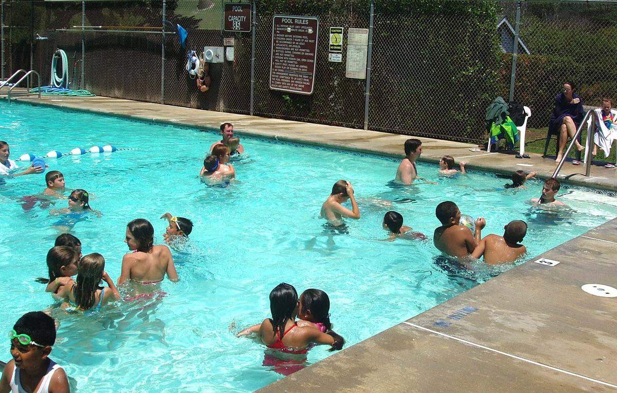 In pre-coronavirus times, swimmers cool down in the pool at the county-operated Shamel Park in Cambria. There are no immediate plans to open the county’s small pools, with social distancing considered impossible.