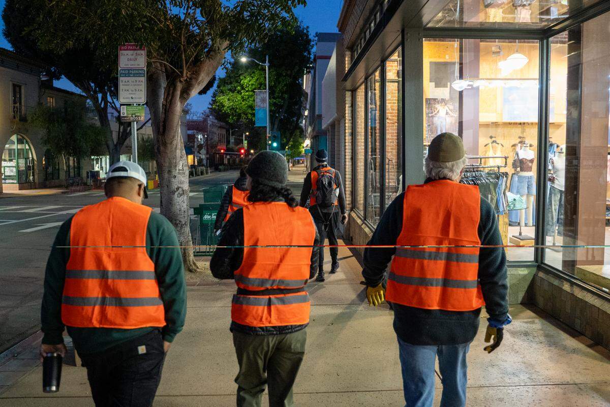 Point-In-Time Count volunteers search for homeless people along Monterey Street in San Luis Obispo on Tuesday, Jan. 27, 2026. The PIT Count is held every other year, and relies on networks of volunteers who count and survey as many homeless individuals as possible.